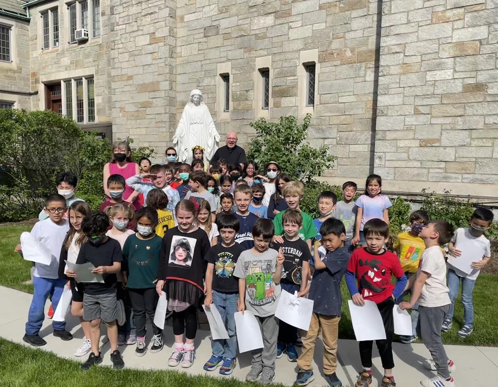 Religious Ed students at the Blessed Mother Mary statue