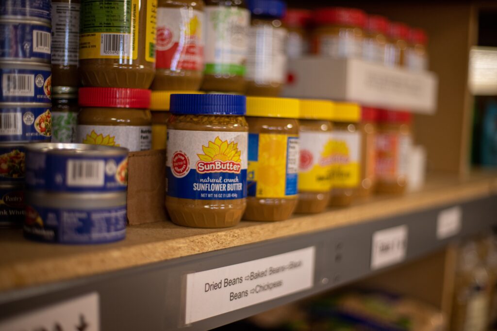 shelf labeled dried beans at a community food pantry